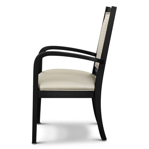 Black chair with ivory cushions.