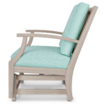 Teal and gray cushioned glider chair.