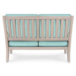 Teal and gray cushioned loveseat.
