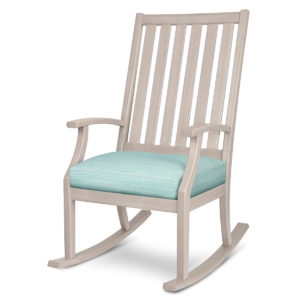 Teal and gray rocker chair with cushion.