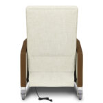 White chair with reclinable backrest.